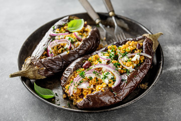 Baked aubergine with bulgur and feta