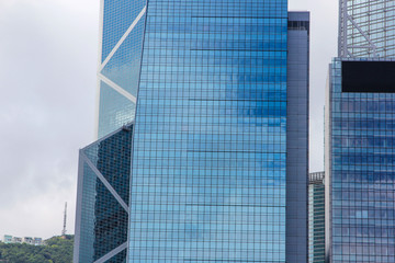 Obraz premium Window glass, Modern architecture in the blue sky white cloud city