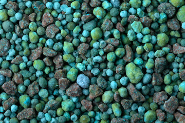green mineral for coniferous plants, with microelements fertilizer texture