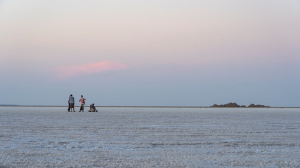 Sunset on the salt plains of Asale Lake in the Danakil Depression in Ethiopia, Africa