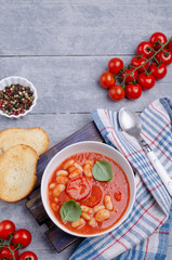 Thick tomato soup with beans
