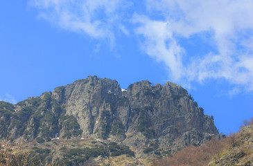 panorama with mountains, rocks and clouds