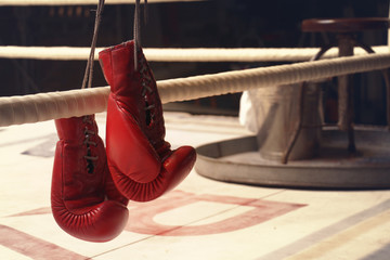 hanging boxing gloves on a rope in horizontal