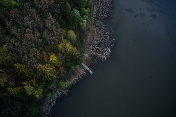 Red boat by the shore