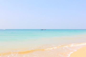 Clear waters and white sandy beaches.