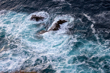 Sea waves with foam top view