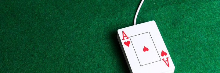 Online internet gambling. Poker cards as a laptop mouse