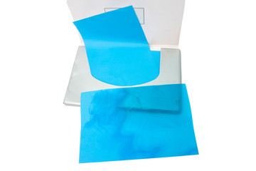 Blue Oil blot sheet paper for remove excess oil on oily face isolated on white background included clipping path.