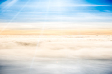 Beautiful airview with blue sky, white clouds and sunrays