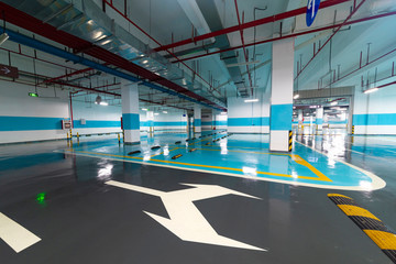 Fototapeta premium Underground parking and ceiling piping systems.