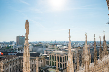 Fototapeta premium White statue on top of Duomo cathedral