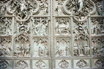 Doors with bas reliefs of cathedral Duomo di Milano