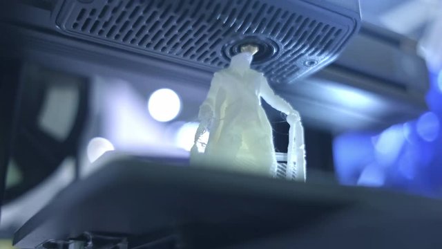 3D printer working close up. Automatic three dimensional 3d printer performs plastic. Modern 3D printer printing an object from the hot molten. Concept progressive additive technology for 3d printing