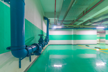 Underground parking and ceiling piping systems.