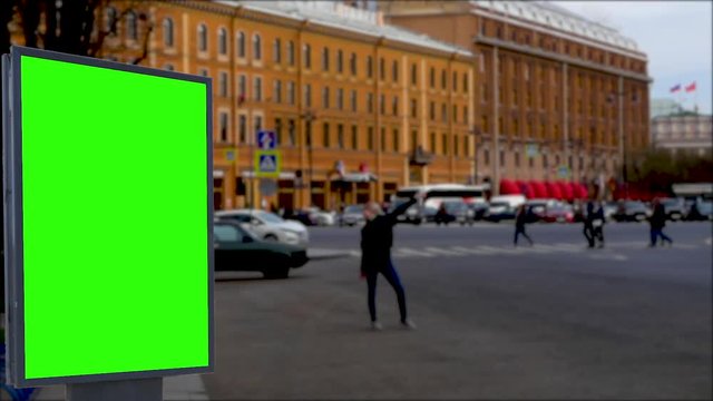 Billboard green screen on the streets of the city