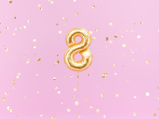 Eight year birthday. Number 8 flying foil balloon on pink. Eight-year anniversary gold confetti background. 3d rendering