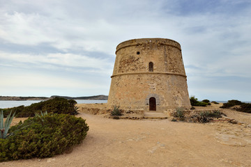 a view of the medieval tower Torre En Rovira in Ibiza Town, Spain
