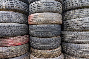Old and used car tires. Background.