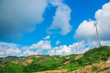 Wind turbines in the mountains near the sea