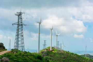 Wind turbines in the mountains near the sea