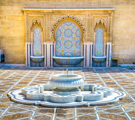 Amazing moroccan style fountain with fine colorful mosaic tiles at the Mohammed V mausoleum in Rabat Morocco. Artistic picture. Beauty world.