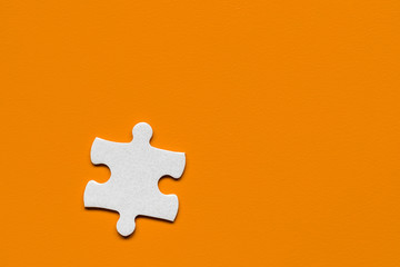 Closeup of jigsaw puzzle isolated. Missing jigsaw puzzle piece, business concept for completing the puzzle piece. Group of puzzle and a puzzle piece. Teamwork concept. Think difference concept.