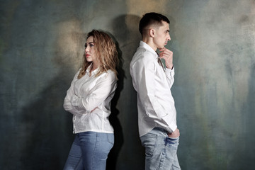 Young couple in love man and woman are offended at each other and no one wants to put up, they are...