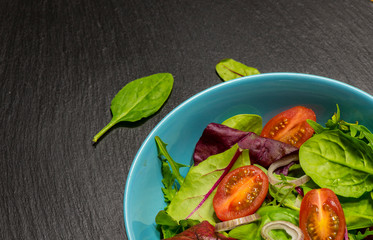 Leaf vegetable salad with tomato