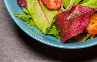 Leaf vegetable salad with tomato