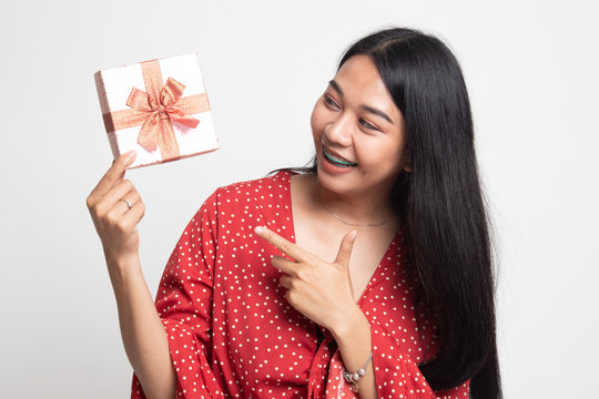 Young Asian woman with a gift box.
