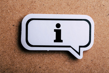Information Sign Speech Bubble Isolated On Brown paper Background