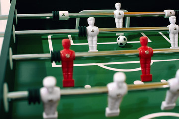 Foosball table soccer sport team football players