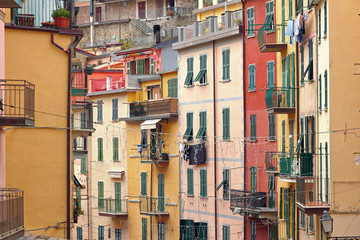 Fototapeta na wymiar View of the colored houses of Riomaggiore, Cinque Terre, Liguria, Italy