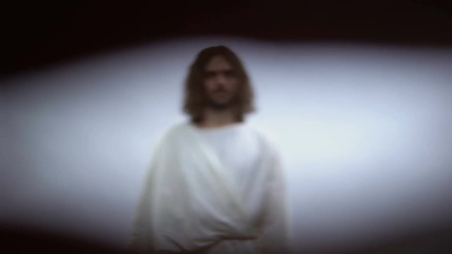 POV of person dying and looking at Jesus in light, God welcoming man to heaven
