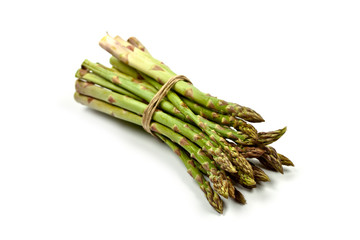 Bunch of fresh raw garden asparagus isolated on white background. Green spring vegetables.