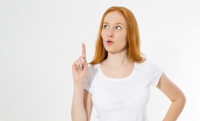 Fototapeta na wymiar Photo wow red hair lady isolated on white background pointing her finger in eureka sign, having great innovative idea, understanding or solution she has just got. Copy space.