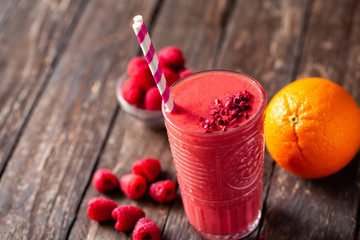 Hard to resist freshly blended citrus and berry fruit smoothie
