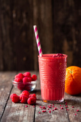 Hard to resist freshly blended citrus and berry fruit smoothie