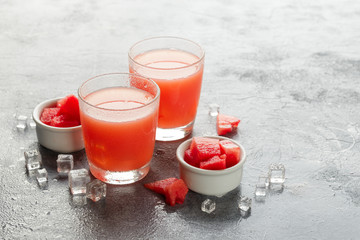 Two bottles of watermelon juice