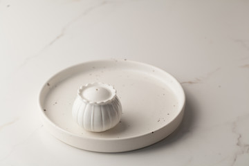 Fototapeta na wymiar Empty classic white plate, fork and salt shaker. copyspace