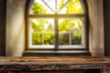 Desk of free space and summer window background 