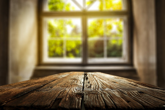 Desk of free space and summer window background 