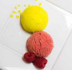 Set of ice cream scoops of different colors and flavours with fruits decoration isolated on white background 