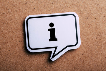Information Sign Speech Bubble Isolated On Brown paper Background