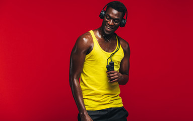 Fit young man taking after from workout
