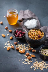 Homemade granola muesli with ingredients, healthy food for breakfast