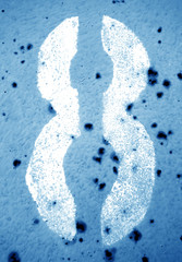 Number 8 in stencil on grungy metal wall in navy blue tone.
