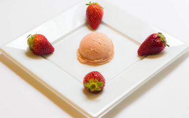Set of ice cream scoops of different colors and flavours with fruits decoration isolated on white...