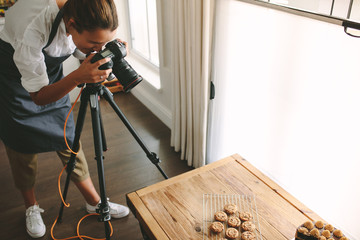 Chef taking pictures of dessert