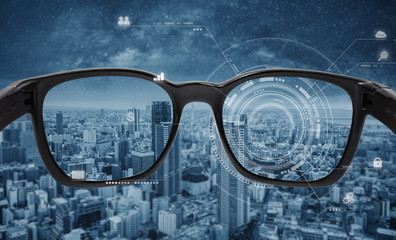 Smart glasses, VR virtual reality, and AR augmented reality technology. Smart glasses with futuristic technology graphics and modern city background